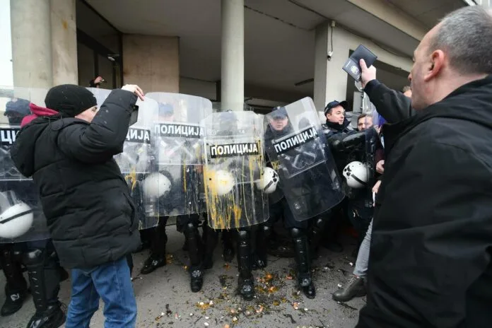 Citizens pelted police and the Novi Sad Assembly building with eggs, red paint, and toilet paper